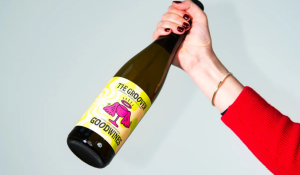 Search Results 5 Hand holding a bottle of Loco Wines